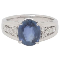 Blue Sapphire Oval and White Diamond Ring in 18k White Gold