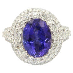 6.00ct Oval Tanzanite and Diamond Double Halo Ring in 14K White Gold