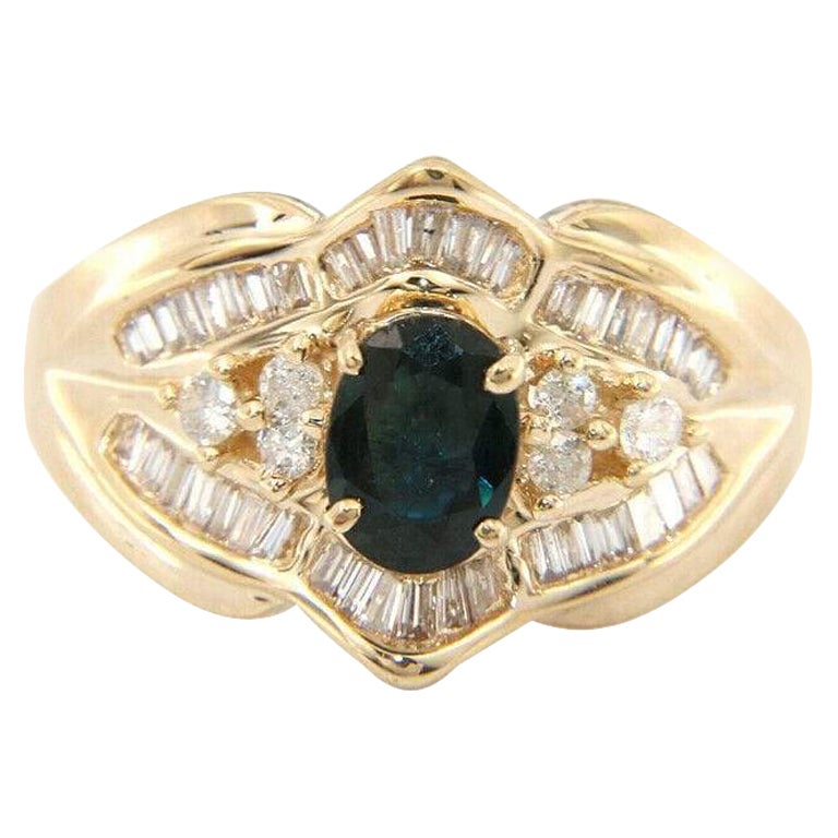 Oval Sapphire and Baguette Diamond Ring in 14K Yellow Gold For Sale