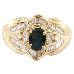 Oval Sapphire and Baguette Diamond Ring in 14K Yellow Gold