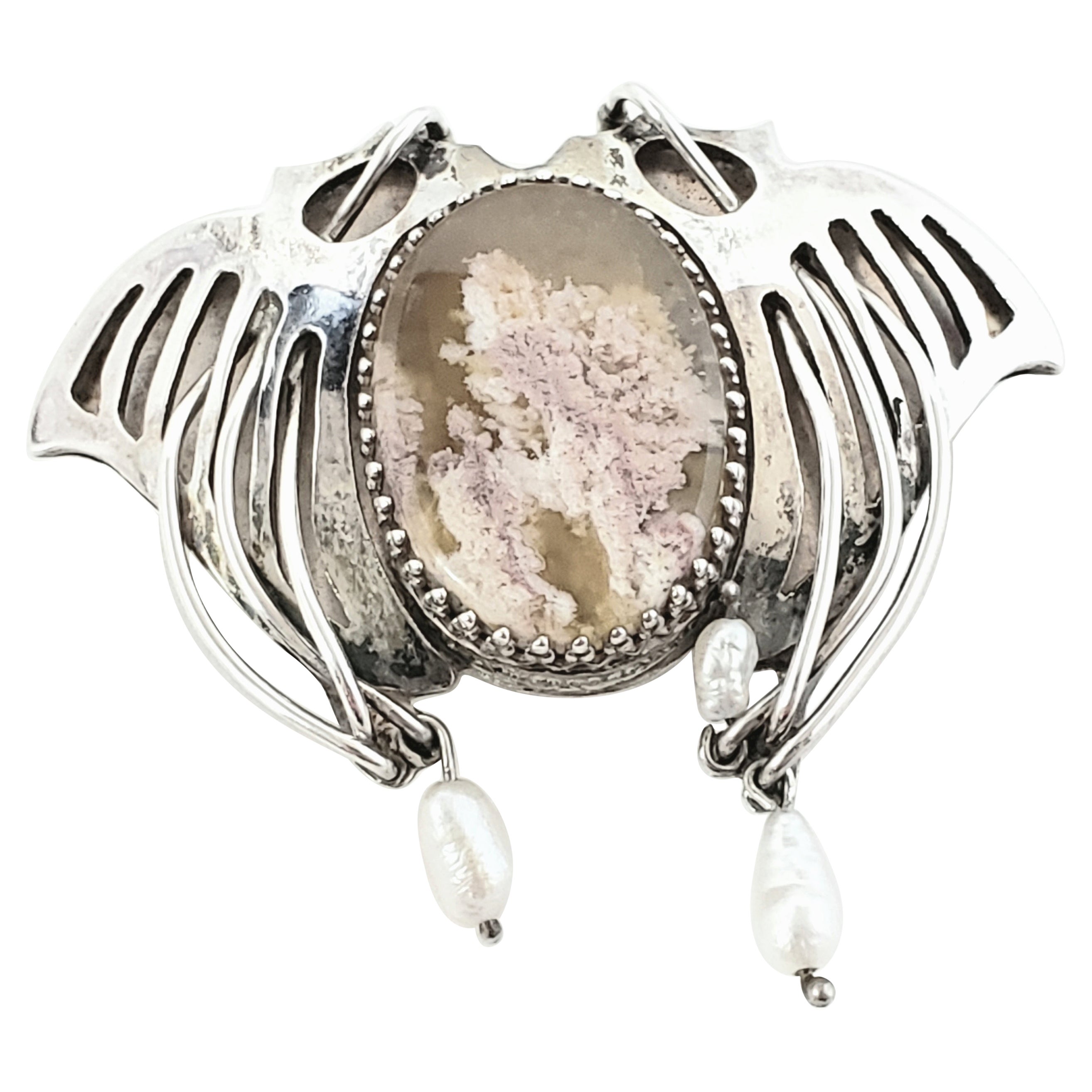 Colgante artesanal de plata de ley con ágata Laguna Lace y perla en forma de ala en venta