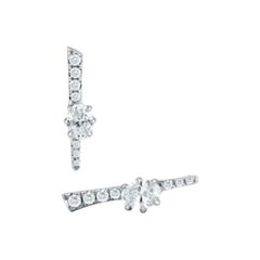 Pave Stud 18 Karat White Gold Earrings with Two Oval Forevermark Diamonds