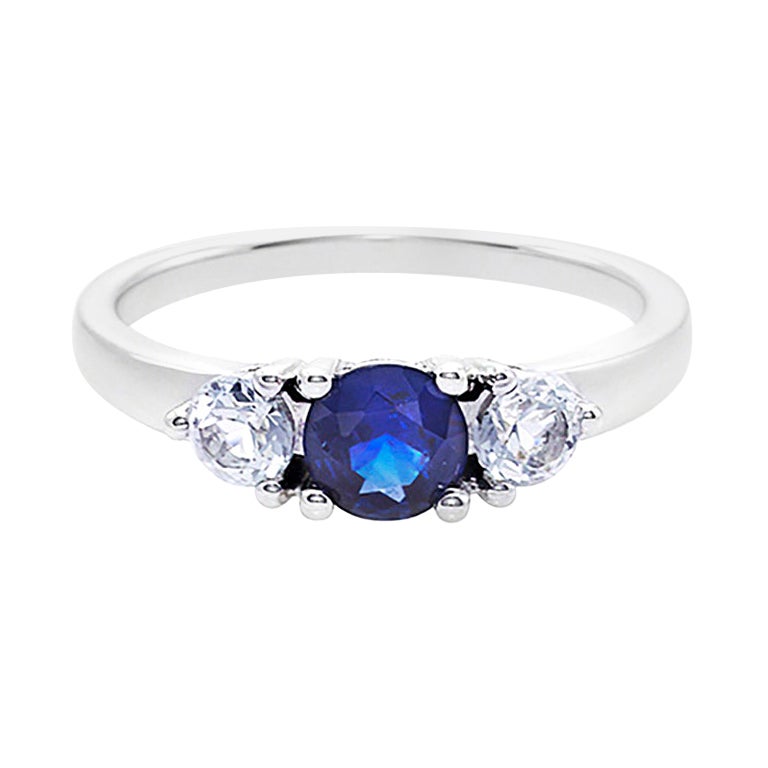 Blue Sapphire and White Sapphire Three Stone Engagement Ring in 18K White Gold For Sale