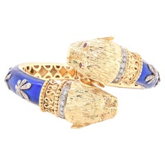 18 Karat Yellow Gold Blue Enamel and Diamond Fu Dog Hinged Bangle Bracelet