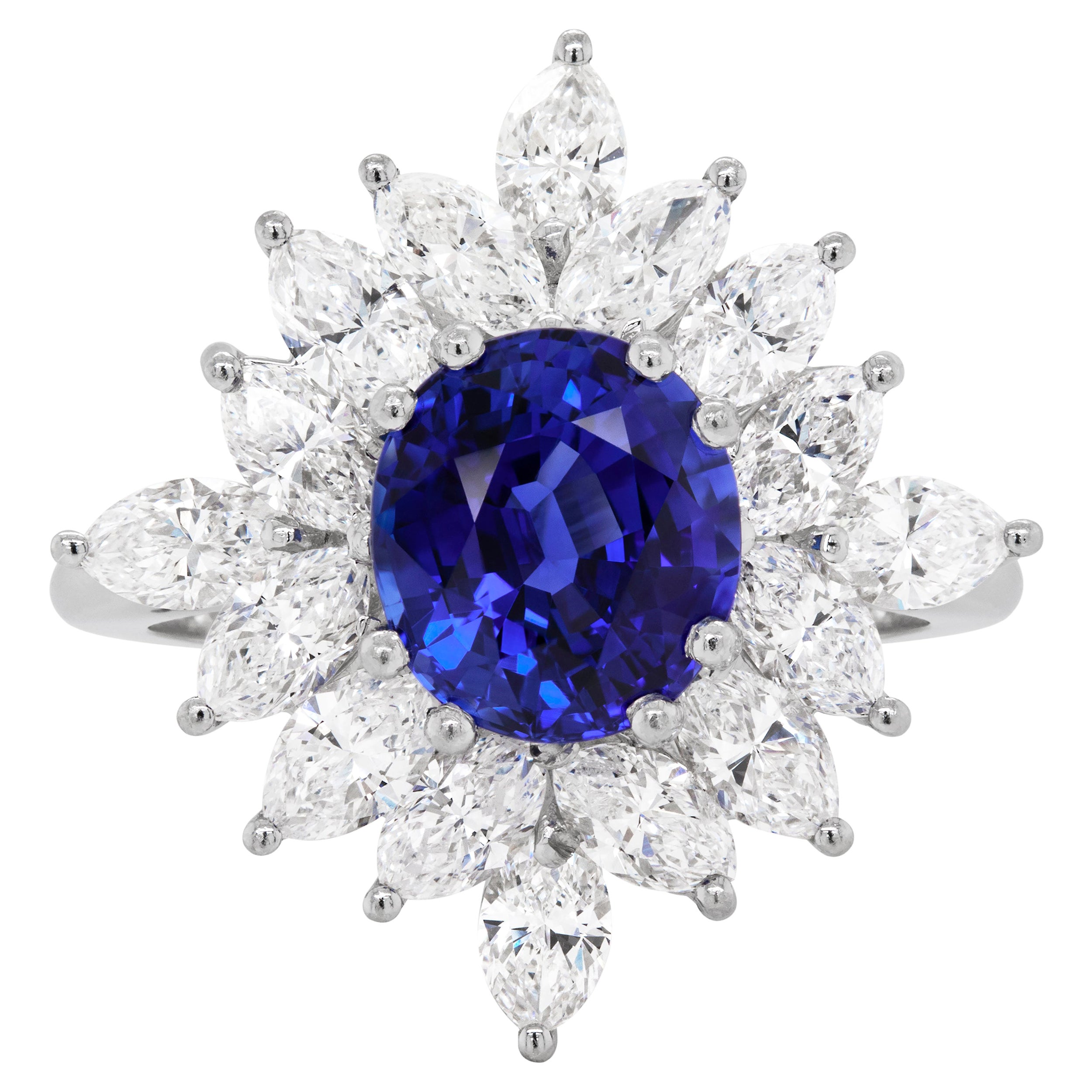 3.09 Carat Royal Blue Oval Sapphire and Diamond Platinum Cluster Ring, 1984