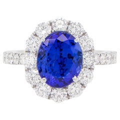 Vivid Blue 3 Carat Oval Tanzanite Ring with 1.46 Carats of Diamonds