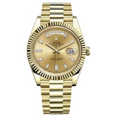 Rolex Day-Date Gelbgold Champagner Baguette Diamant Zifferblatt Präsident 228238