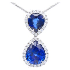 18K White Gold, 4.46 Carat Blue Sapphire with Diamond Halos Pendant Necklace