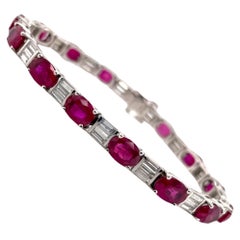 Oval Ruby & Baguette Diamond Tennis Bracelet in Platinum