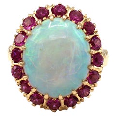 Vintage 14 Karat Yellow Gold Opal & Pink Sapphire Halo Cocktail Ring