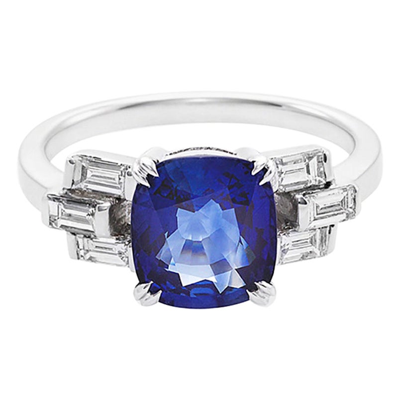 For Sale:  Cushion Cut Ceylon Blue Sapphire and Bagguatte Diamond Engagement Ring