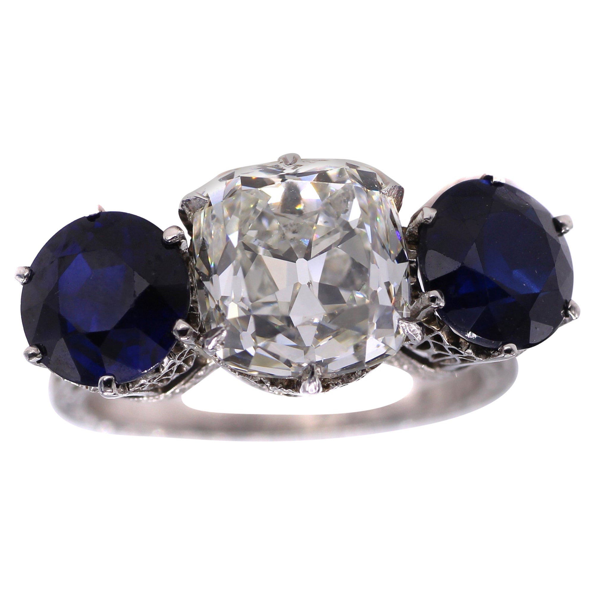 Edwardian 4.04 Carat Cushion GIA Certified Diamond Sapphire 3 Stone Ring