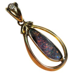 Australian Boulder Opal Diamond Pendant and Chian 18 Karat Yellow Gold