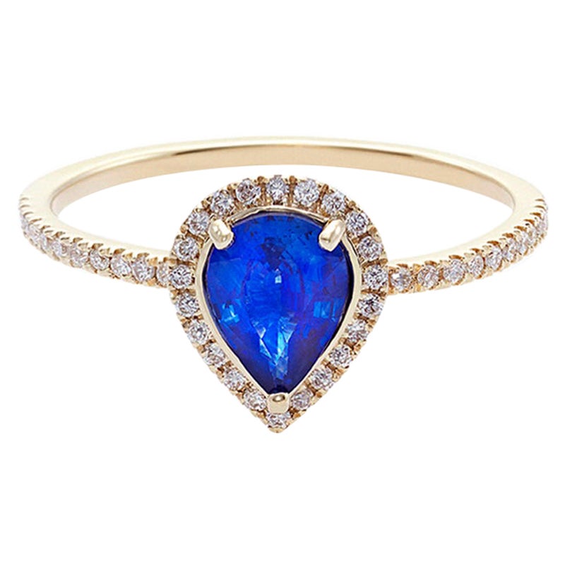 Verlobungsring aus 18 Karat Gelbgold mit blauem Saphir und Diamant in Birnenform