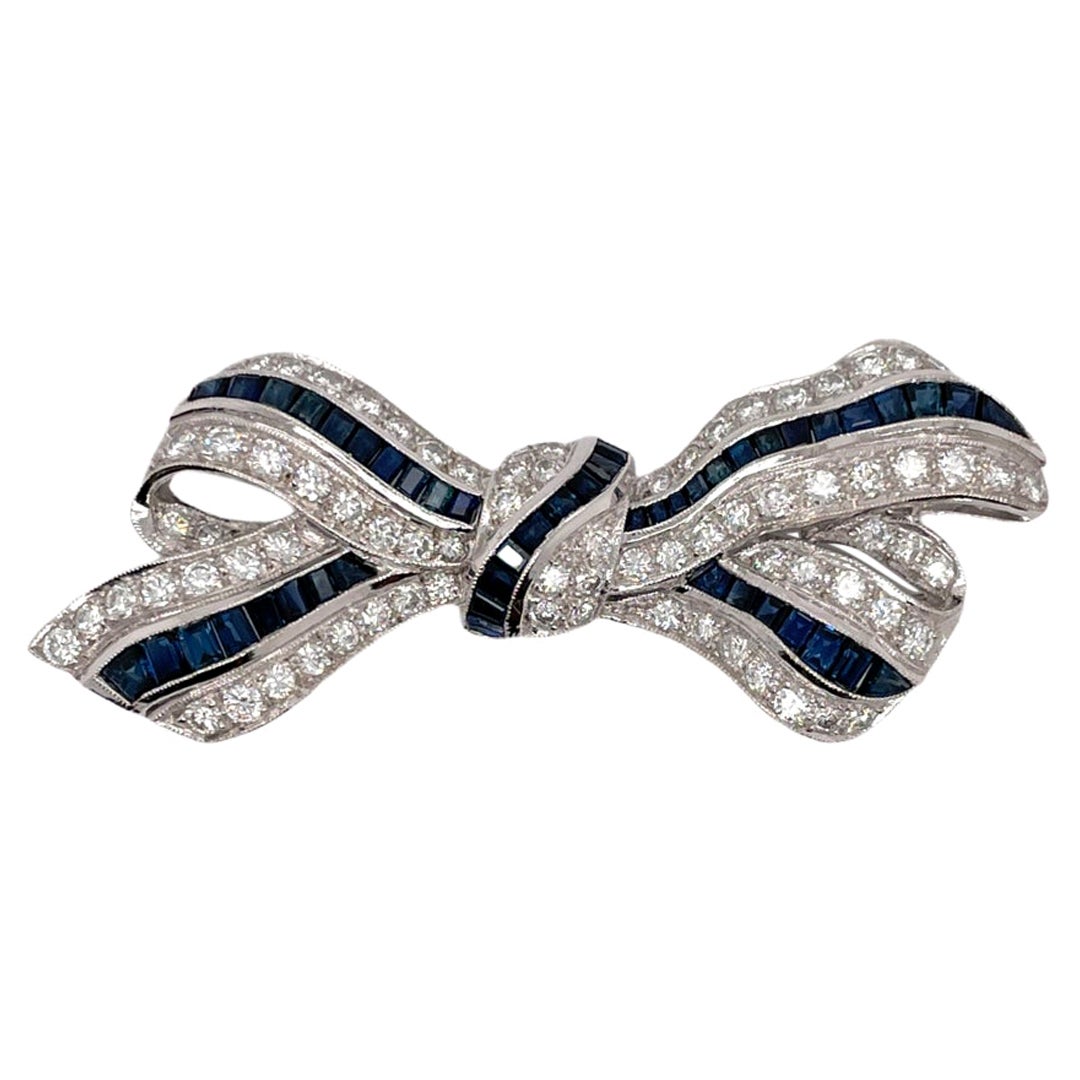 Sapphire & Diamond Bow Ribbon Brooch in 18K White Gold For Sale