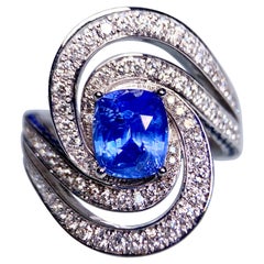 Bague Eostre en or blanc 18 carats avec saphir bleu vif et diamants