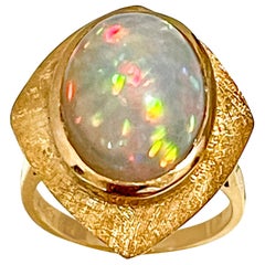 8.5 Carat Oval Shape Ethiopian Opal Cocktail Ring 14 Karat Yellow Gold