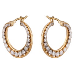 Boucle d'oreille en or avec diamant de 0,94cts
