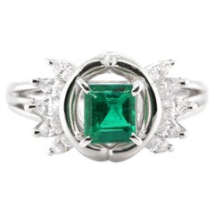 0.73 Carat Natural Emerald and Diamond Cocktail Ring Set in Platinum
