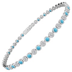 Bracelet tennis en or blanc 18 carats serti d'un chaton de diamants et de turquoises