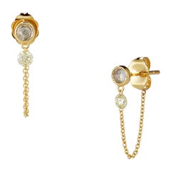 Boucles d'oreilles en chaîne avec diamants nus ''0.20 TCW''.