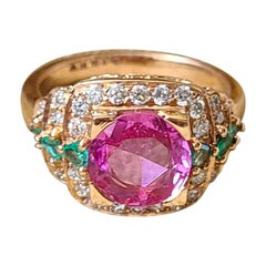 Set in 18K Gold, Natural Pink Sapphire, Emerald and Diamonds Cocktail Ring