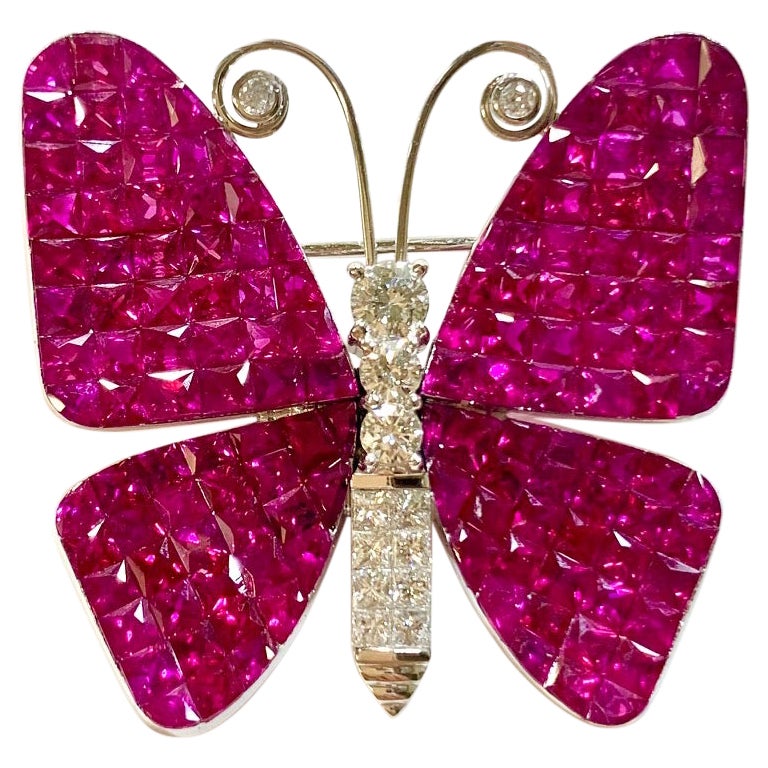 15.99 Carat Invisible Set Ruby and Diamond Brooch For Sale
