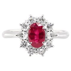 1.32 Carat Natural Ruby and Diamond Halo Engagement Ring Set in Platinum