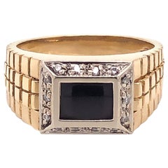 Retro Men's Onyx and Diamond Ring in 14 Karat Yellow Gold