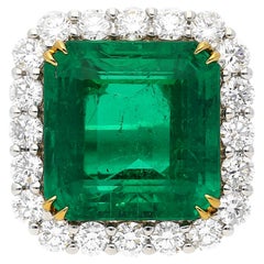 AGL Certified 16.46 Carat Vivid Green Colombian Emerald and Diamond Halo Ring