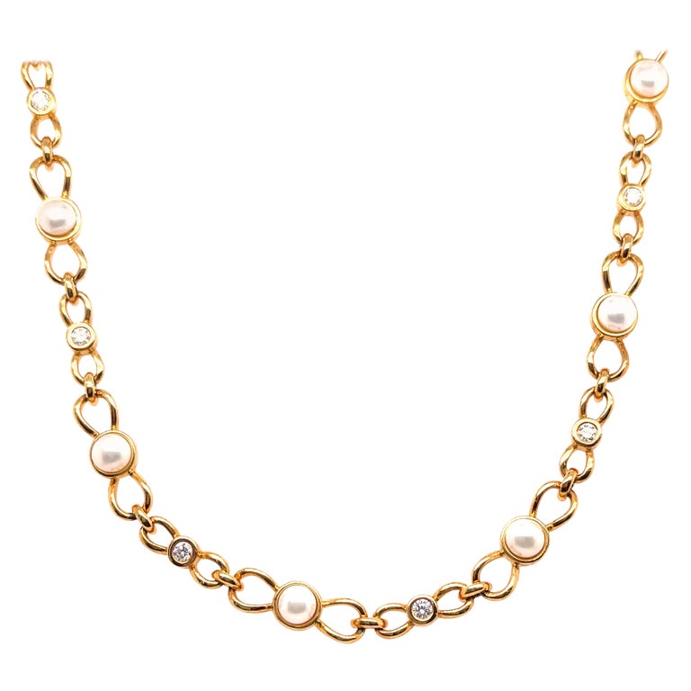 Tiffany and Co. Gold Pearl Diamond Bow Tie Link Necklace For Sale at