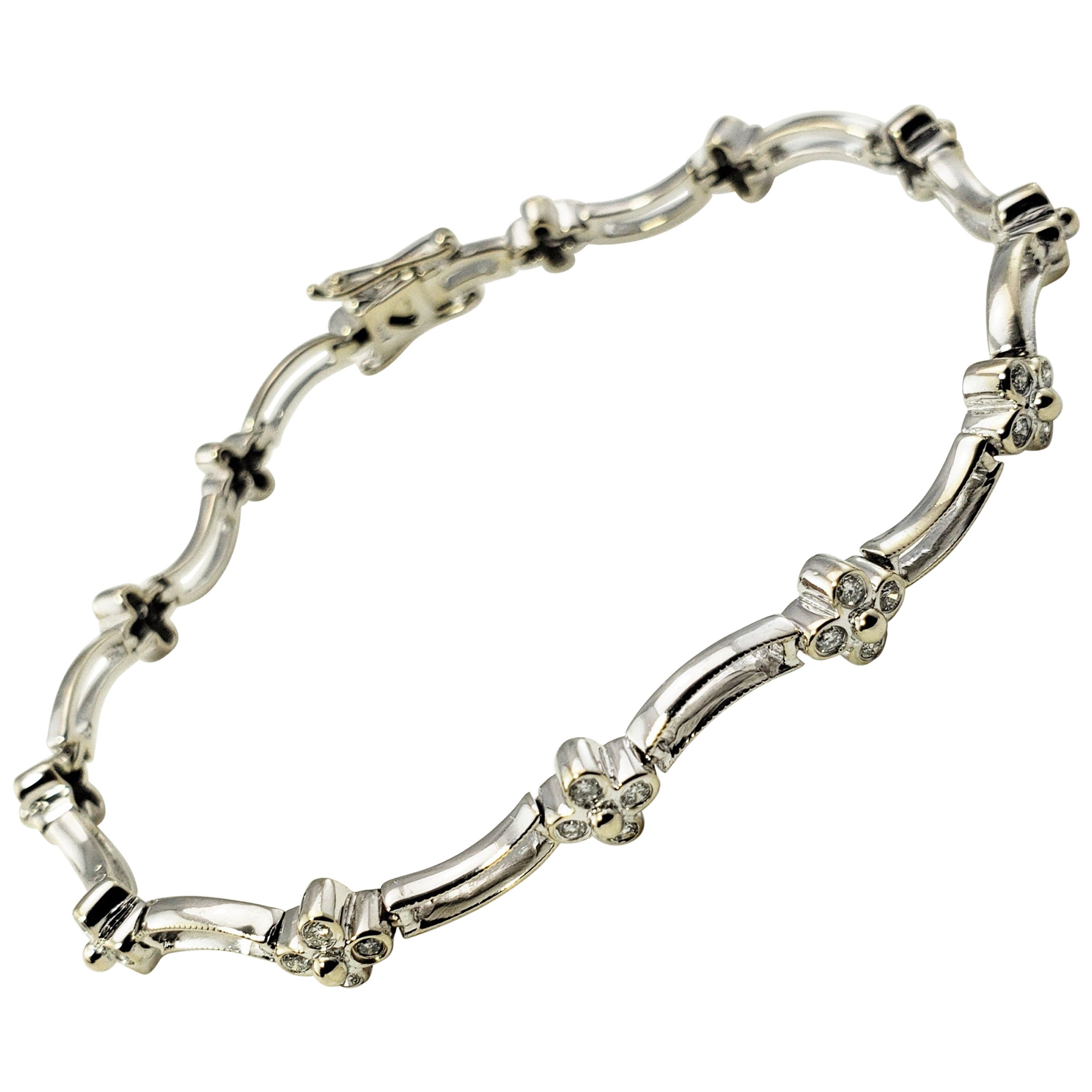 18 Karat White Gold Diamond Flower Bracelet For Sale