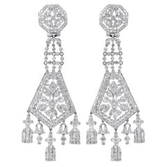 Boucles d'oreilles en or blanc 14 carats et diamants