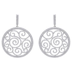 Boucles d'oreilles en or blanc 18 carats et diamants