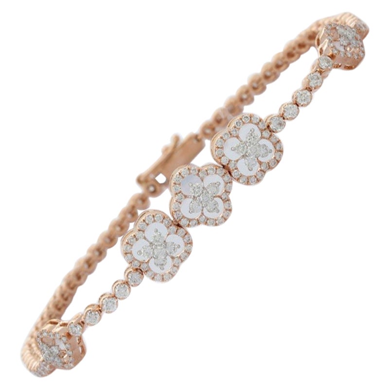 This 2.89 Carat Diamond Modern Bracelet in 14K gold showcases sparkling natural diamonds, weighing 2.89 carats. 
April birthstone diamond brings love, fame, success and prosperity.
Designed with round cut diamonds studded in a flower making a