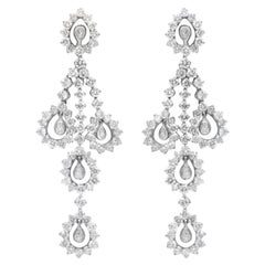 Boucles d'oreilles en or blanc 18 carats et diamants