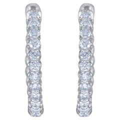 Boucles d'oreilles en or blanc 14 carats et diamants