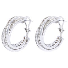 Boucles d'oreilles en or blanc 14 carats et diamants