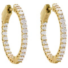 Boucles d'oreilles en or jaune 14 carats et diamants