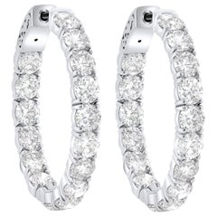 Boucles d'oreilles en or blanc 18 carats et diamants