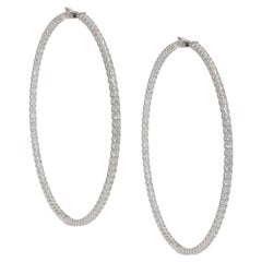 Boucles d'oreilles en or blanc 18 carats et diamants