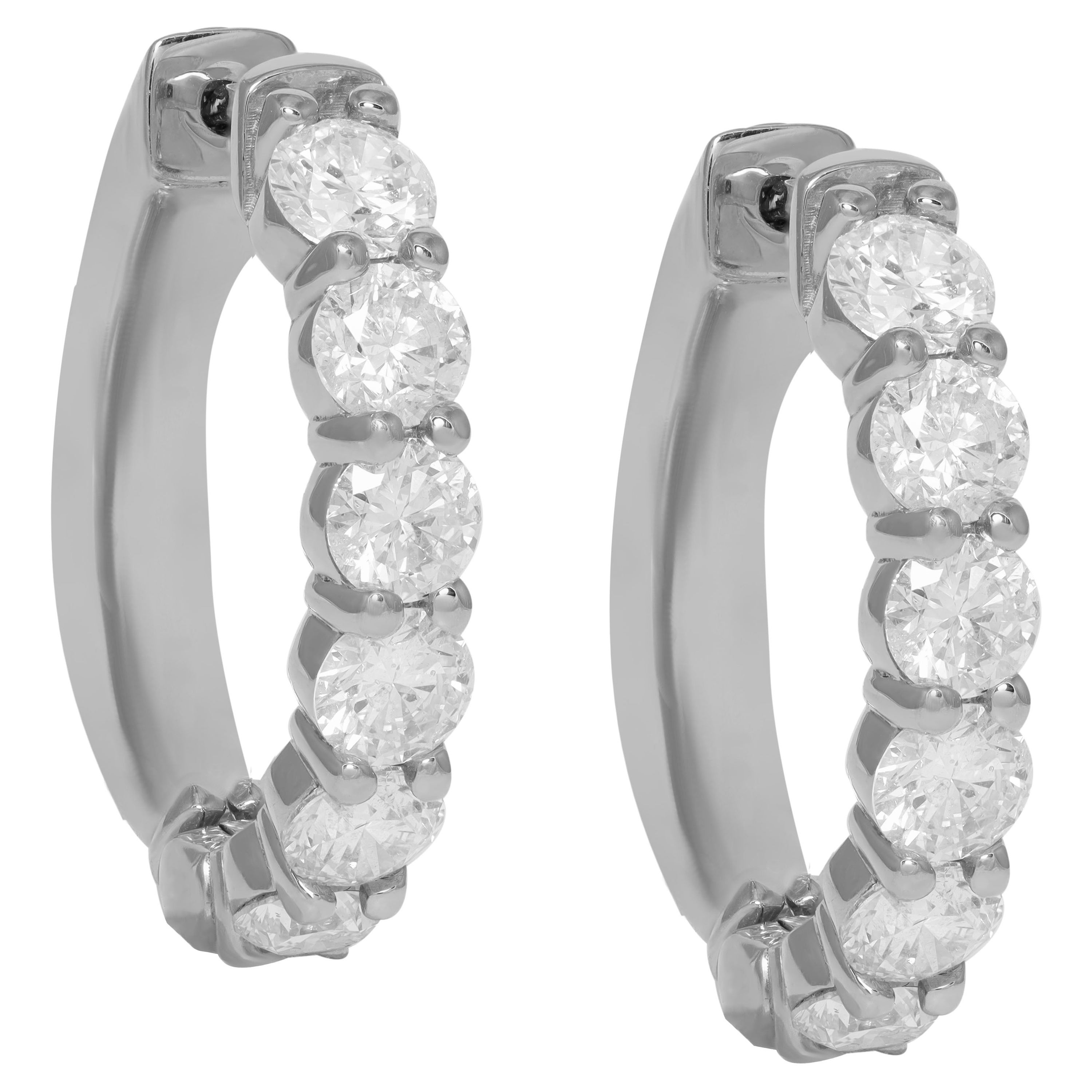 Diana M, 14 kt white gold, .50" half-way hoop earrings featuring 1.00 cts tw  For Sale