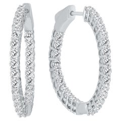 Boucles d'oreilles en or blanc 14 carats et diamants