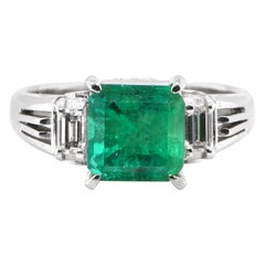 Vintage 1.92 Carat Natural Emerald and Diamond Three Stone Ring Set in Platinum