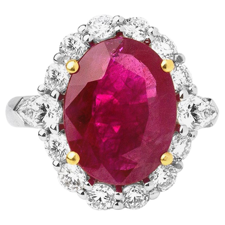 5.40 Carats Natural Ruby Solitaire Ring Surrounded with 1.55 Ct's Diamonds For Sale