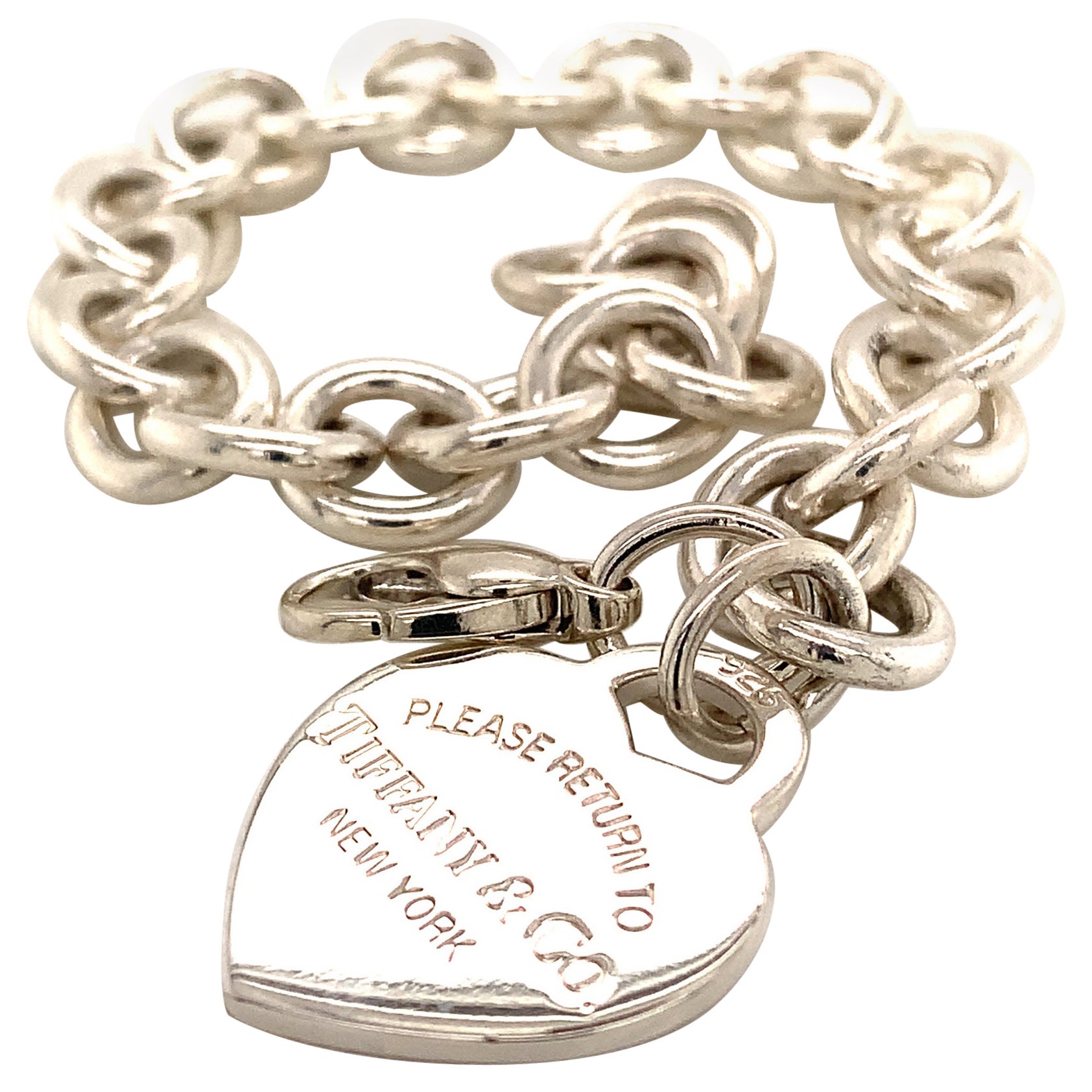 TIFFANY&CO Gold Charm Bracelet with Signature Charms at 1stDibs