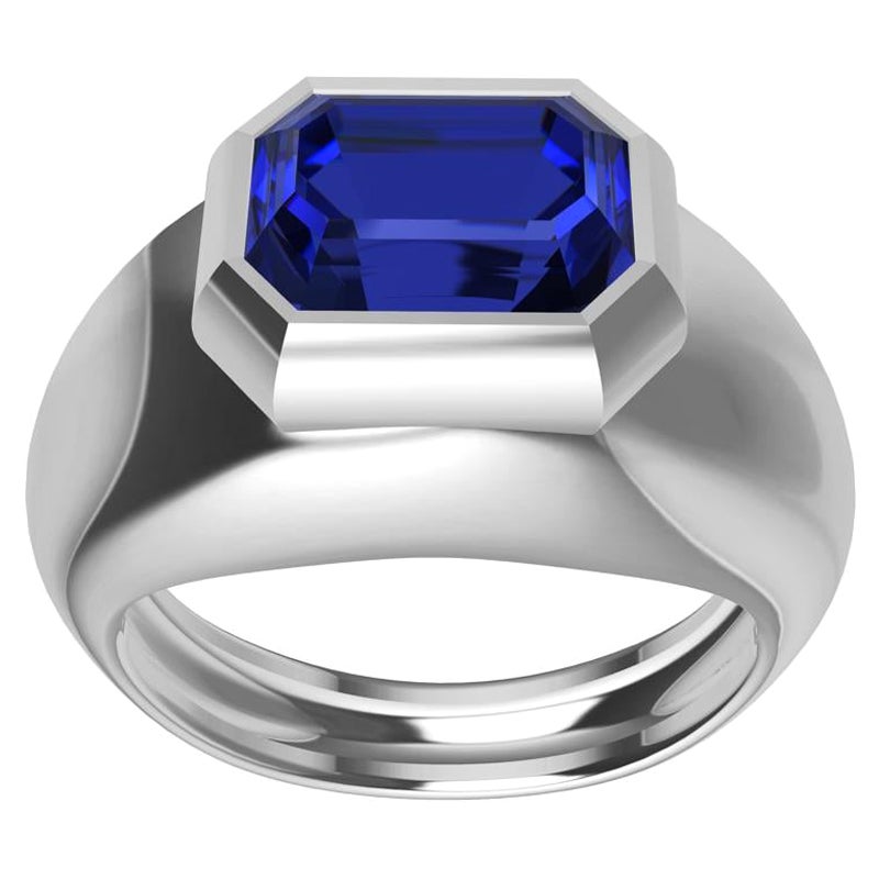 Bague sculpture en platine avec saphir bleu taille émeraude de 2,54 carats