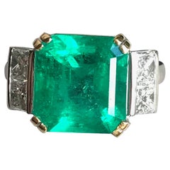 Ring with Emerald 5.95 Carats and 18 Carat White Gold with Diamonds