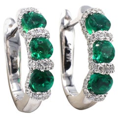 14 Karat White Gold Emerald & Diamond Huggie Hoop Earrings