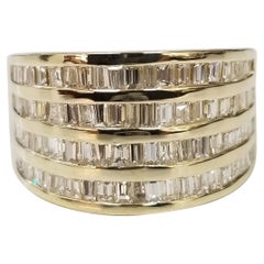 14 Karat Gelbgold 4 Reihen Diamant Baguette Kanal gesetzter Ring